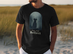 Black t-shirt with a graphic of a dog looking at a misty forest scene.