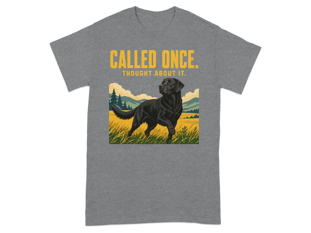 Black Labrador dog in field with text "CALLED ONCE. THOUGHT ABOUT IT."