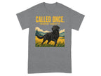 Black Labrador dog in field with text "CALLED ONCE. THOUGHT ABOUT IT."