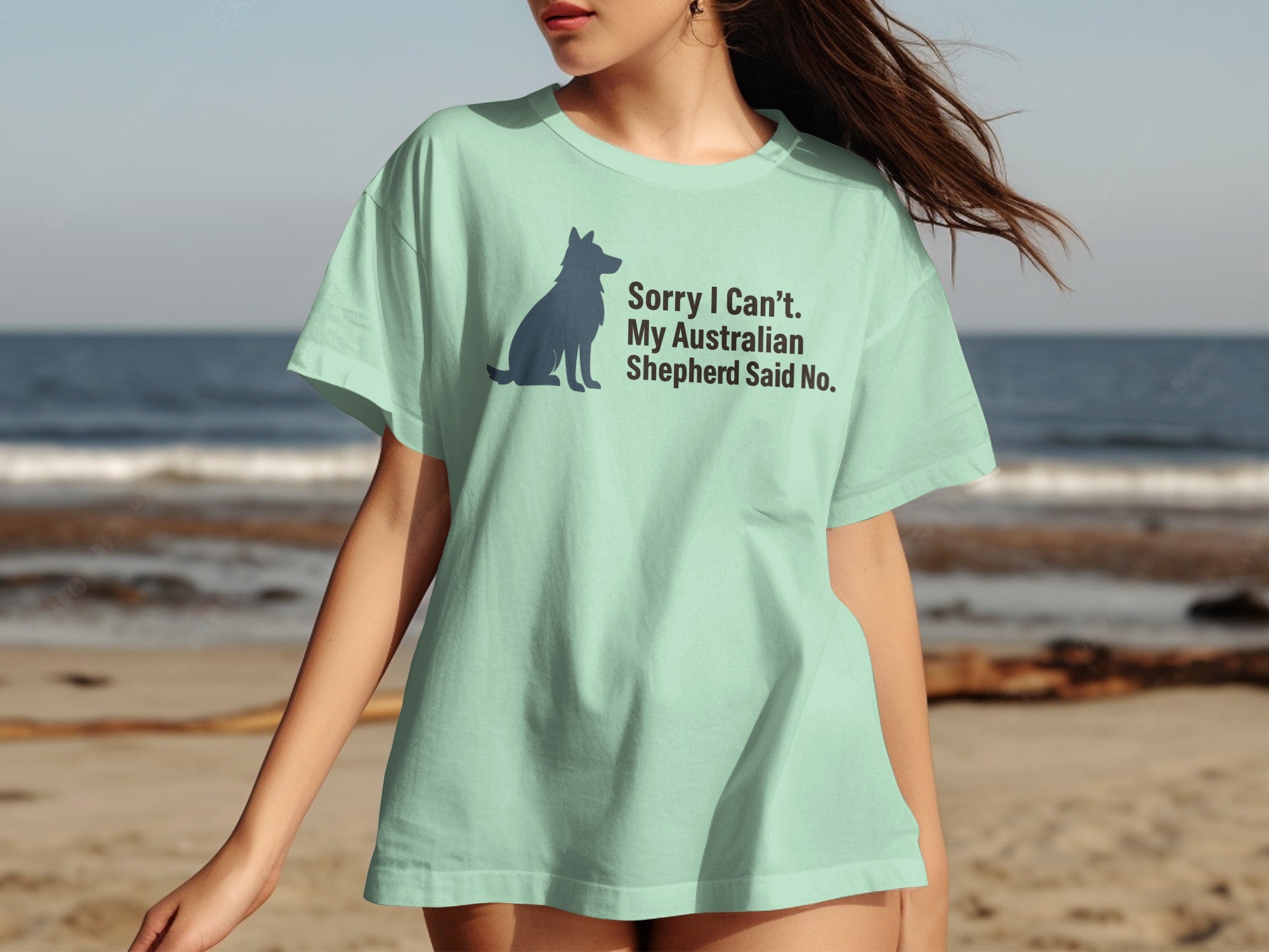 Light green t-shirt with silhouette and text: Sorry I Can't. My Australian Shepherd Said No.