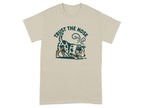 Beige t-shirt featuring a dog sniffing the ground with text "TRUST THE NOSE".