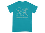 Teal t-shirt with line art of a dog on a leash and text "Slow down, enjoy walks".