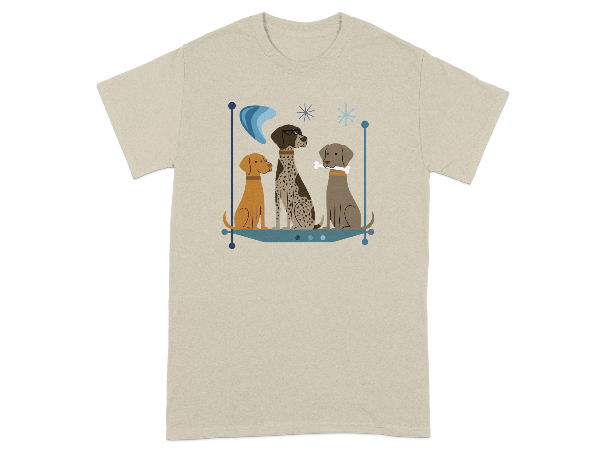 Three dogs with geometric designs on a light tan t-shirt.