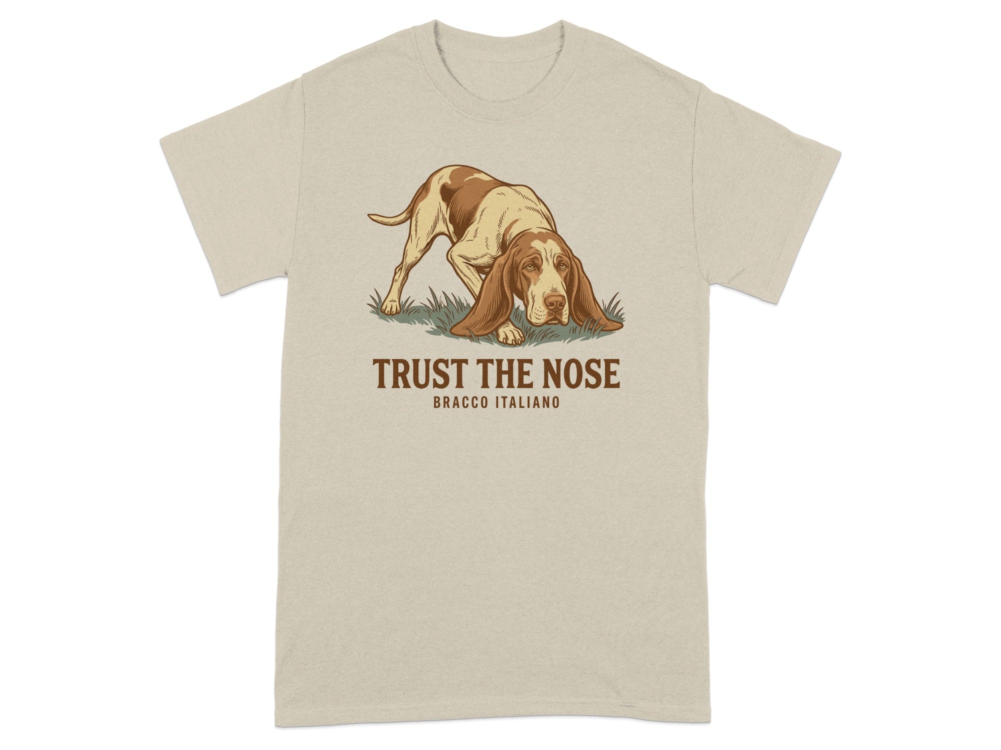 Bracco Italiano dog with "TRUST THE NOSE" text on beige t-shirt.