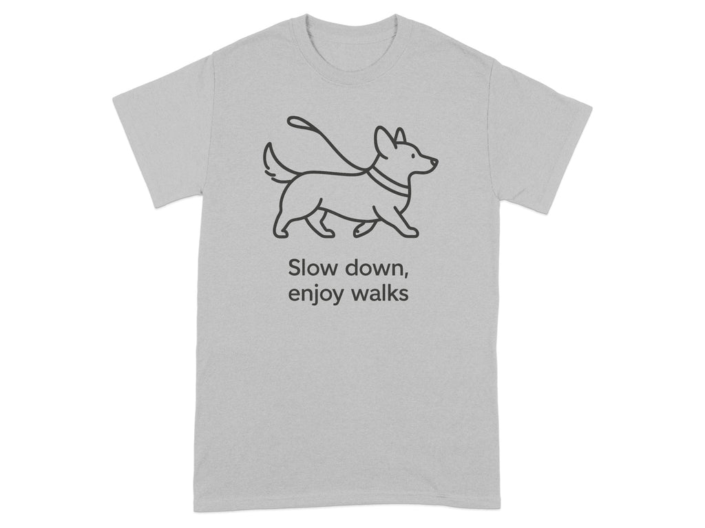Light grey t-shirt with a line drawing of a dog on a leash and text saying "Slow down, enjoy walks."