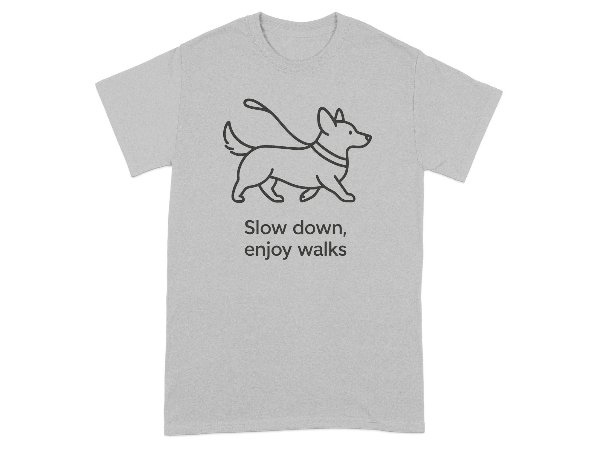 Light grey t-shirt with a line drawing of a dog on a leash and text saying "Slow down, enjoy walks."