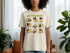 Cream t-shirt with green text "PUG MOOD CHART" above cartoon pugs in various poses.