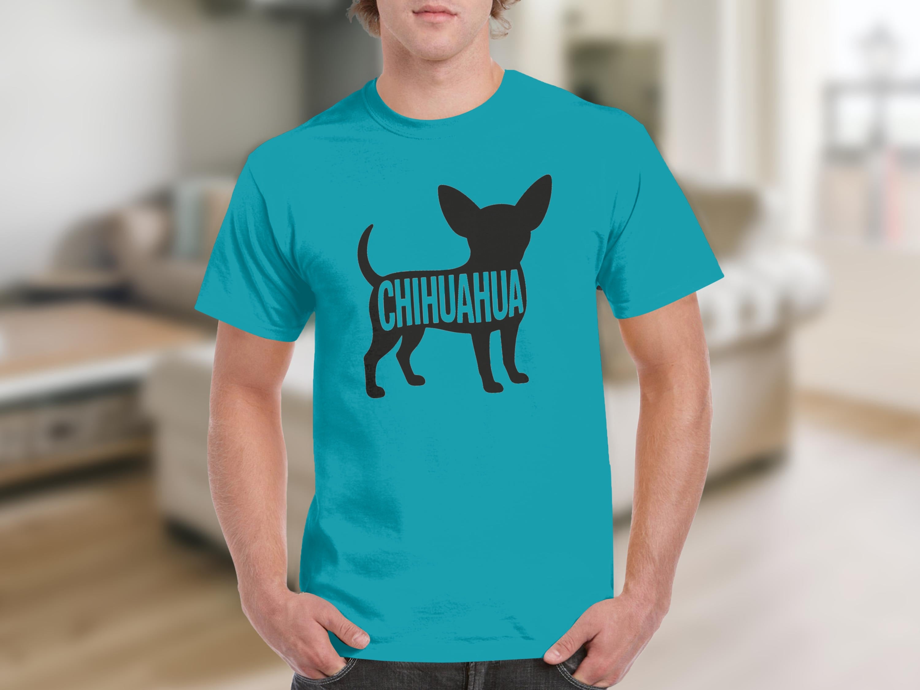 Turquoise t-shirt with black chihuahua silhouette graphic featuring the word "chihuahua" inside.