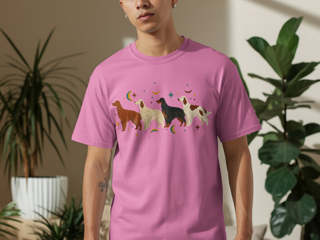 Pink t-shirt with four stylized dogs and stars pattern.