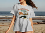 T-shirt with greyhounds running and sleeping, text "BUILT FOR SPEED GREYHOUND".