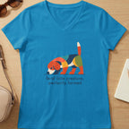 Blue v-neck shirt with a colorful geometric dog graphic and text.