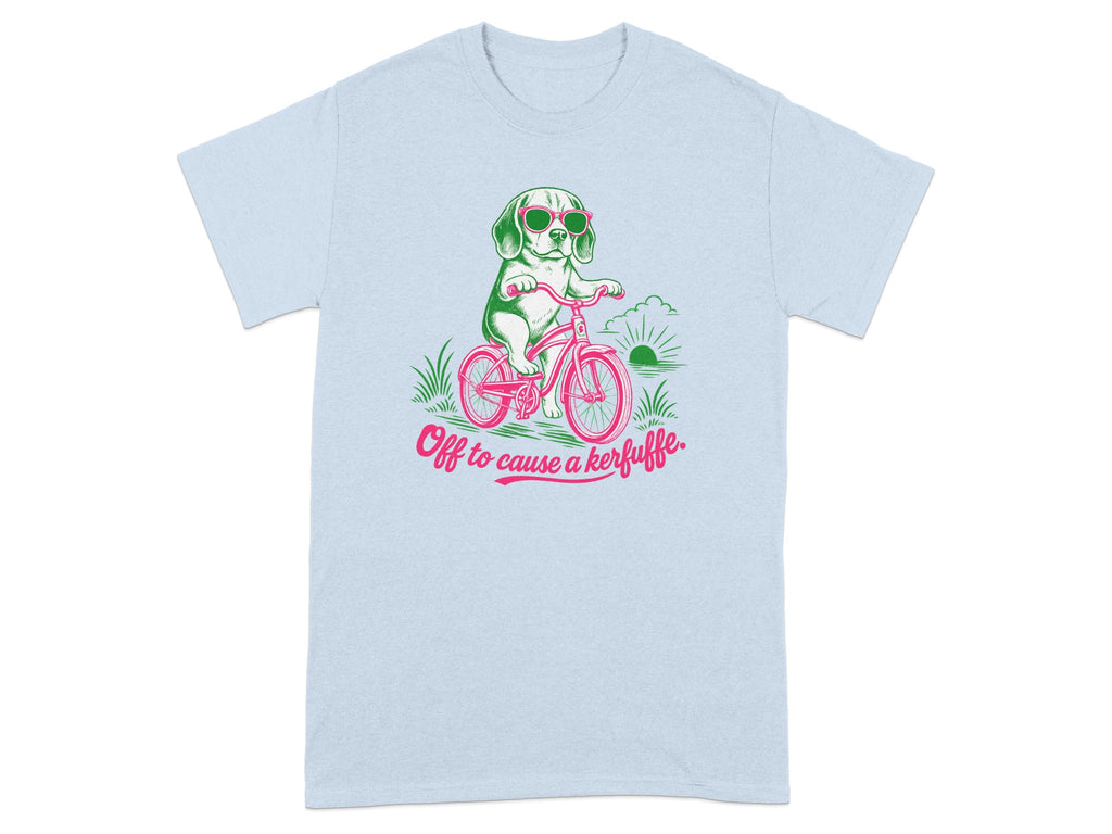Light blue t-shirt with a cartoon dog riding a bicycle, wearing sunglasses.