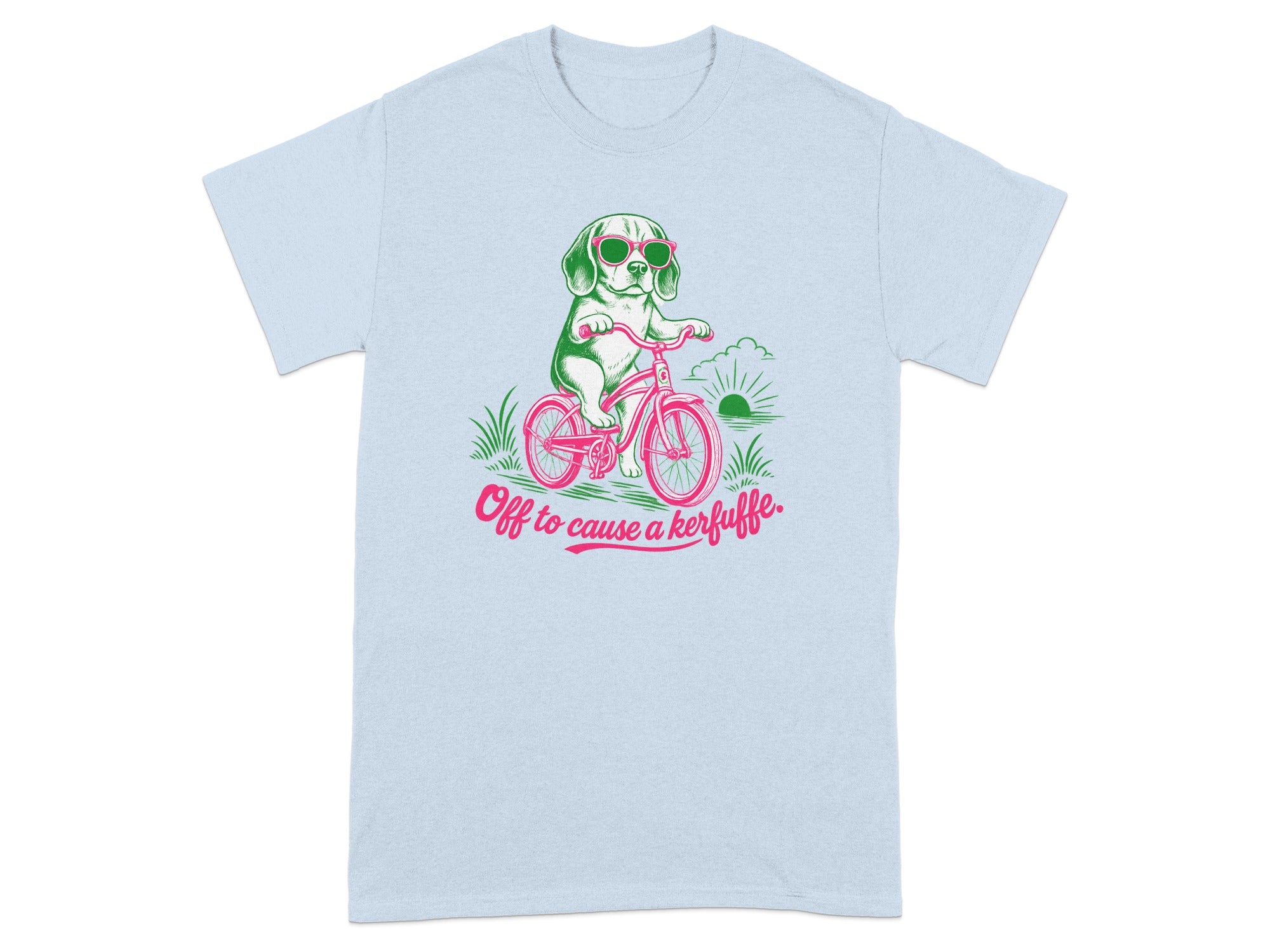 Light blue t-shirt with a cartoon dog riding a bicycle, wearing sunglasses.