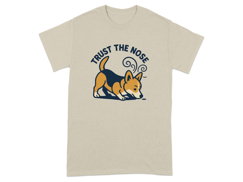 Light tan t-shirt with a cartoon corgi sniffing and text "TRUST THE NOSE".