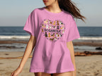 Pink t-shirt with a heart-shaped collage of dogs and "DOGAHOLIC" text.