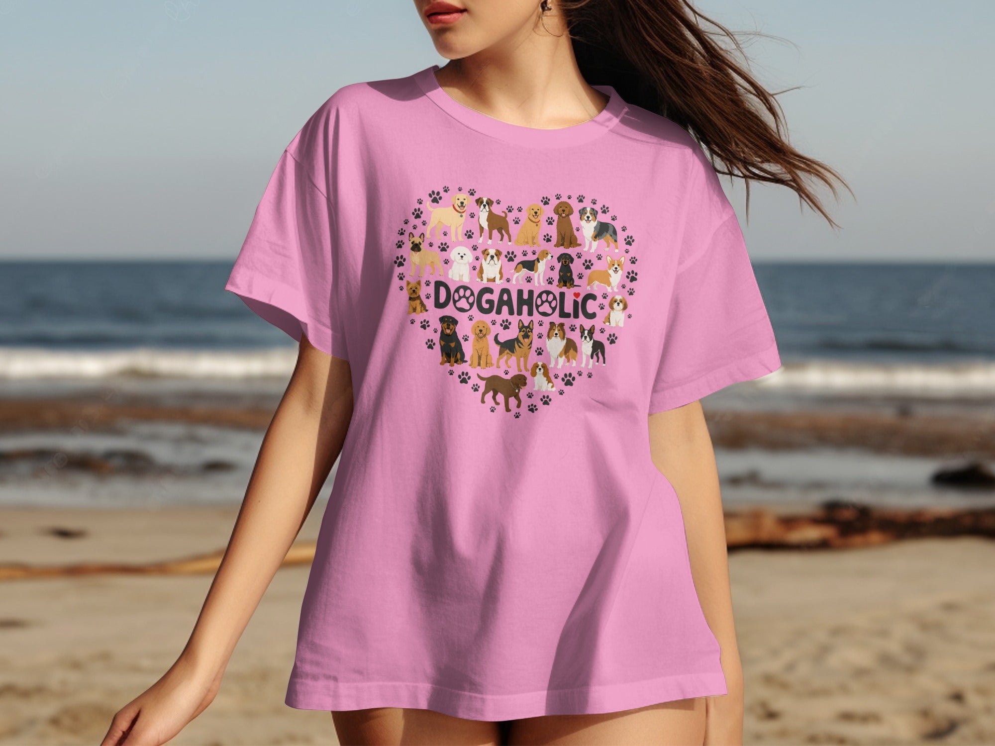 Pink t-shirt with a heart-shaped collage of dogs and "DOGAHOLIC" text.