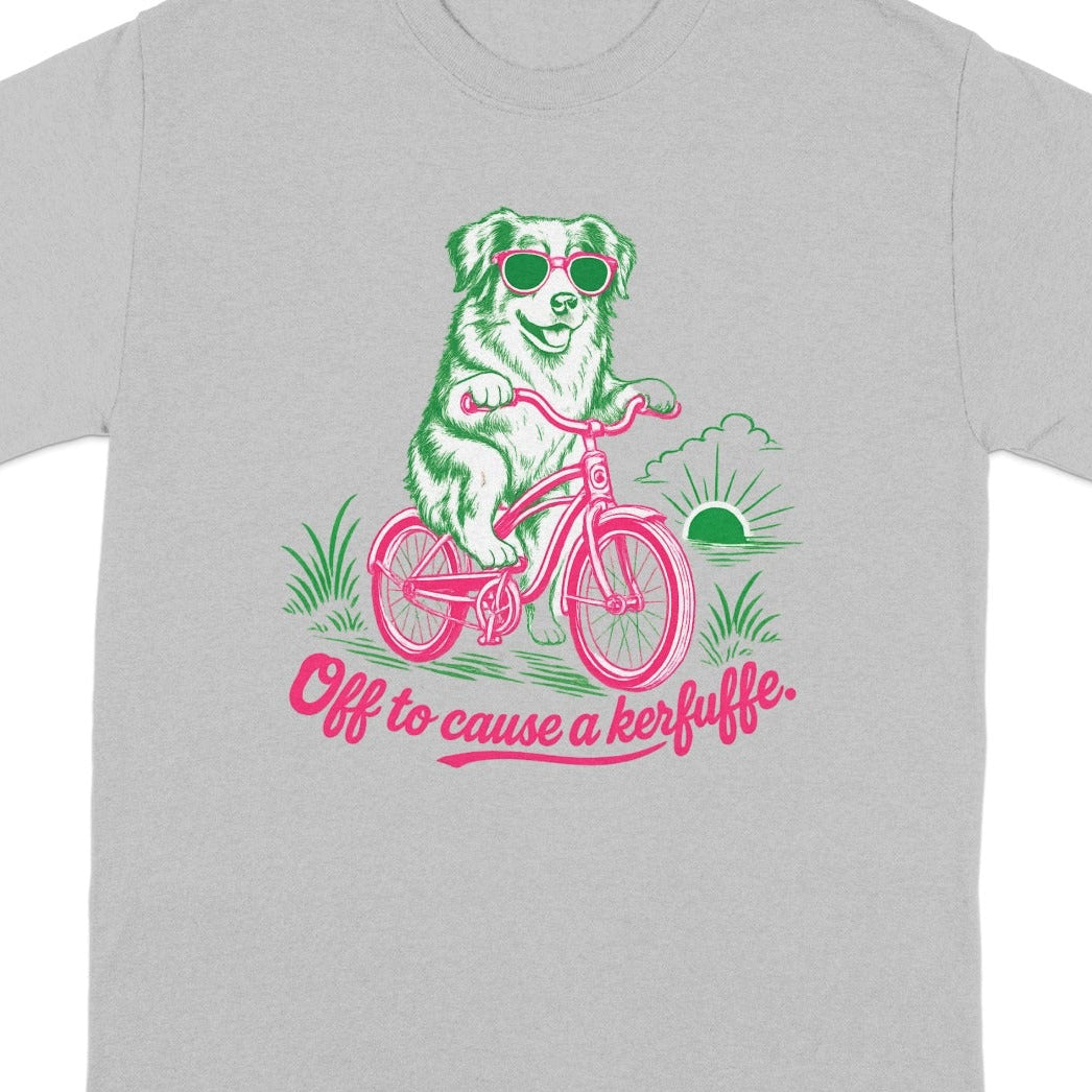 T-shirt with dog on a bicycle wearing sunglasses and text "Off to cause a kerfuffle."