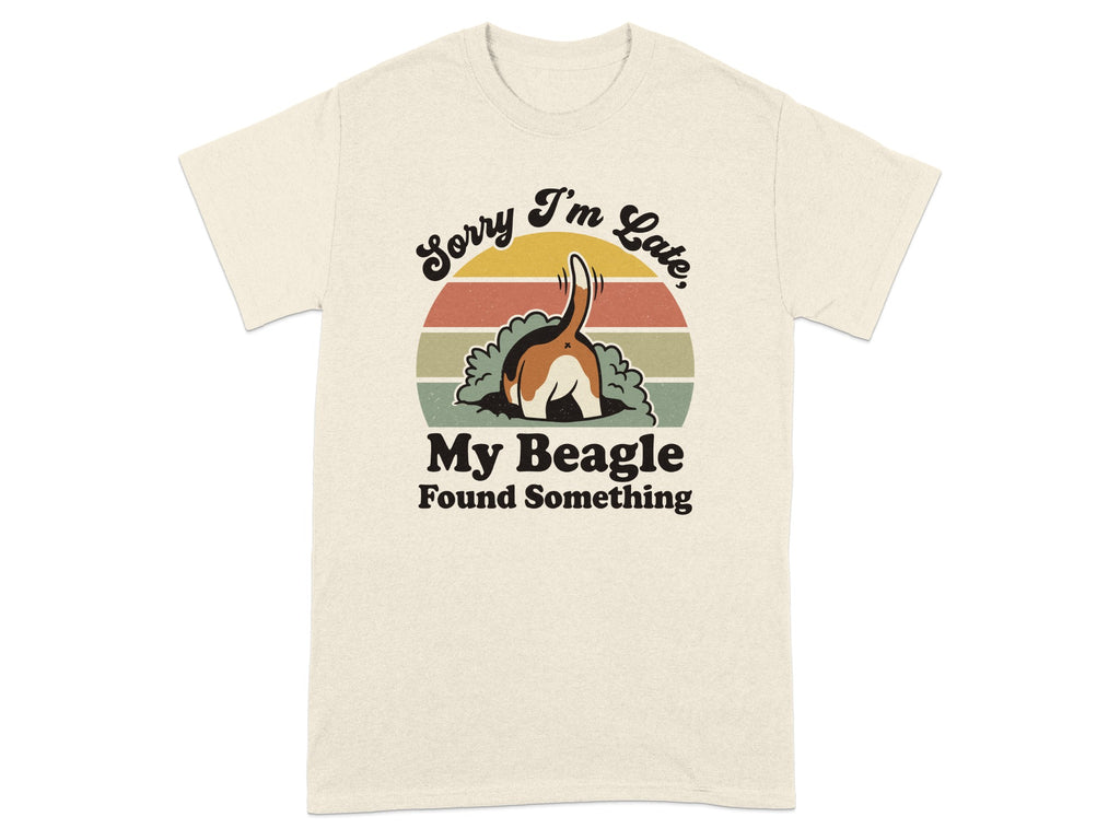 Beagle with tail up digging in dirt, "Sorry I'm Late, My Beagle Found Something" text.