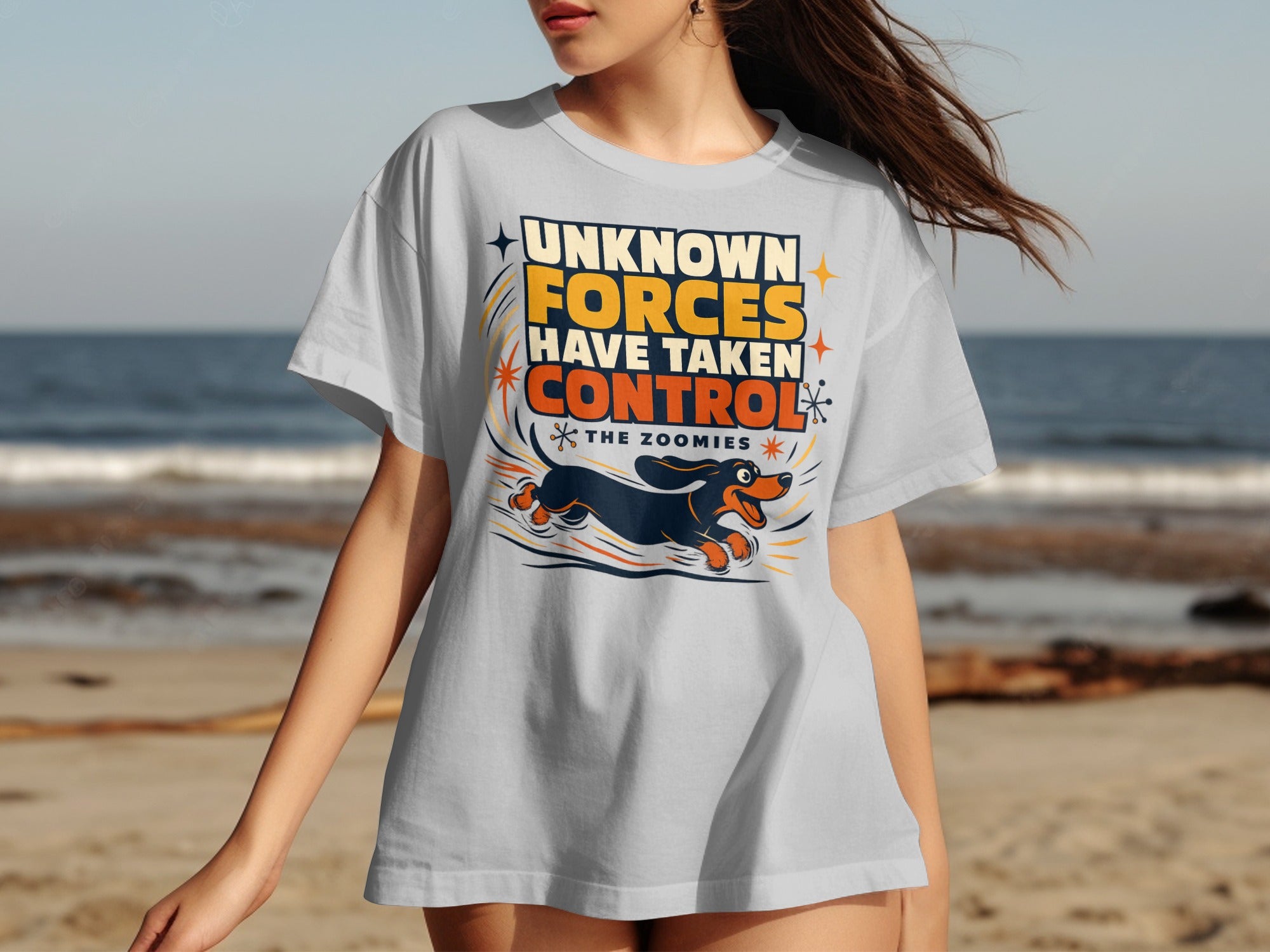 Light grey t-shirt with dachshund running and text "Unknown Forces Have Taken Control the Zoomies".