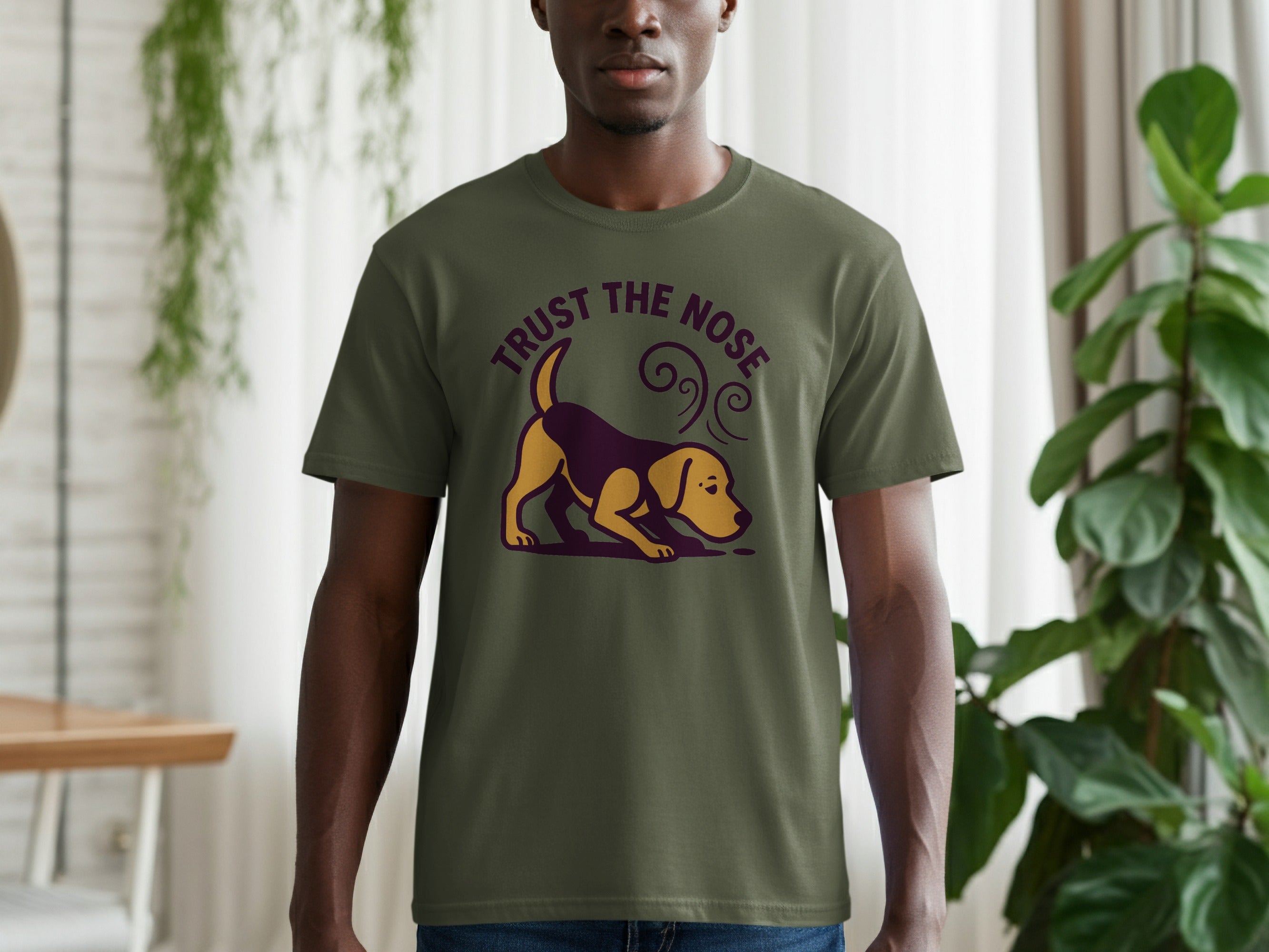 Green t-shirt with a beagle sniffing and text "TRUST THE NOSE".