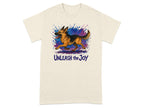 German Shepherd running with colorful paint splatters and text "Unleash the Joy".