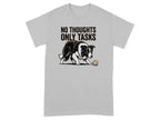 T-shirt with a black and white dog and the text "NO THOUGHTS ONLY TASKS."