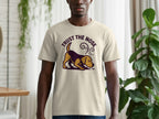 Cream t-shirt with cartoon dog graphic and "TRUST THE NOSE" text.