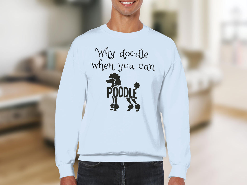 White sweatshirt with black poodle graphic and "Why doodle when you can poodle" text.