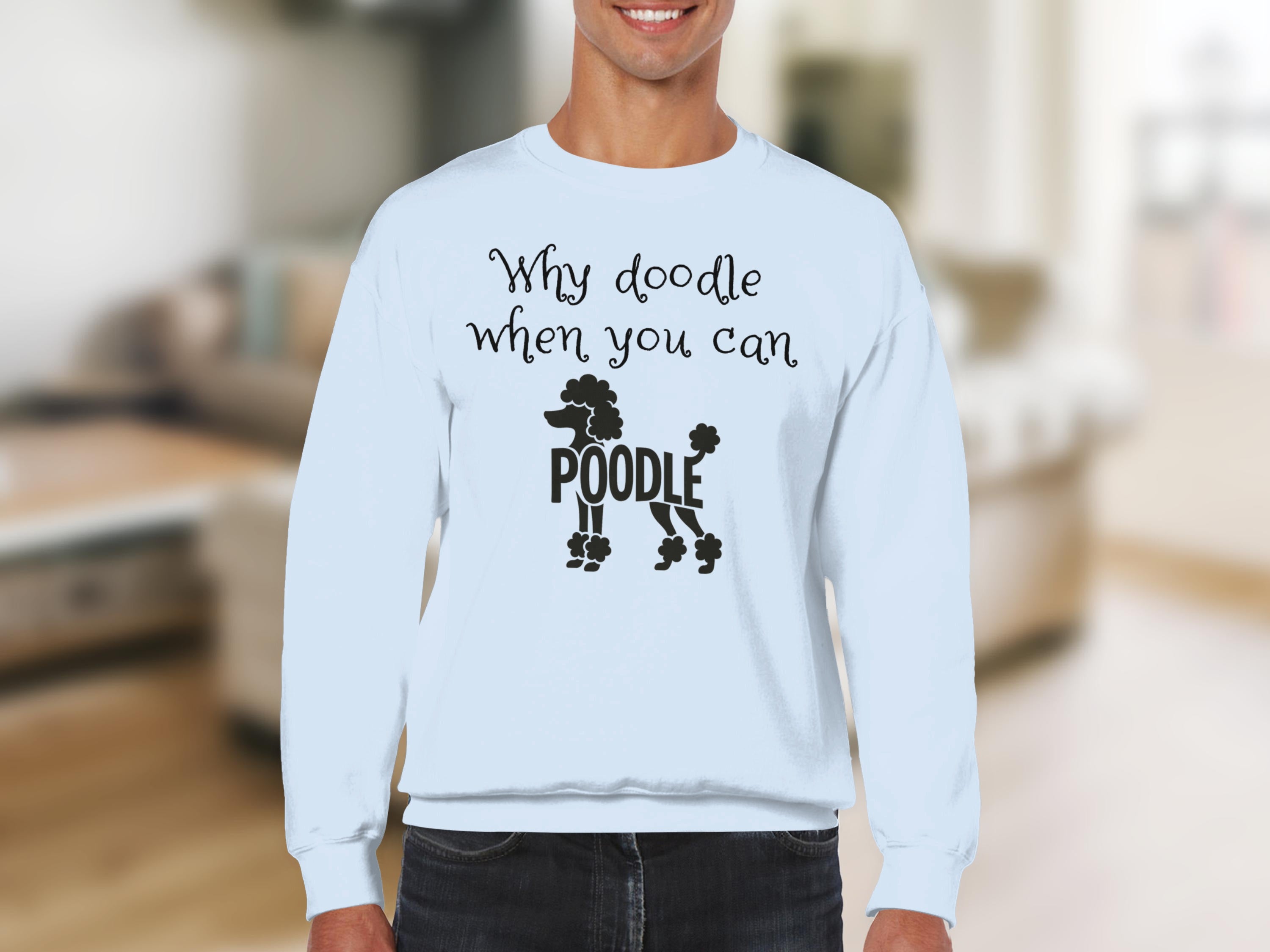 White sweatshirt with black poodle graphic and "Why doodle when you can poodle" text.