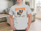 White t-shirt with orange text "DRIVEN BY MOTION AND ANXIETY" and a running dog.