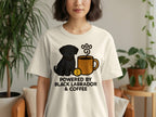 Cream t-shirt with a black Labrador, coffee cup, and text reading "POWERED BY BLACK LABRADOR & COFFEE."