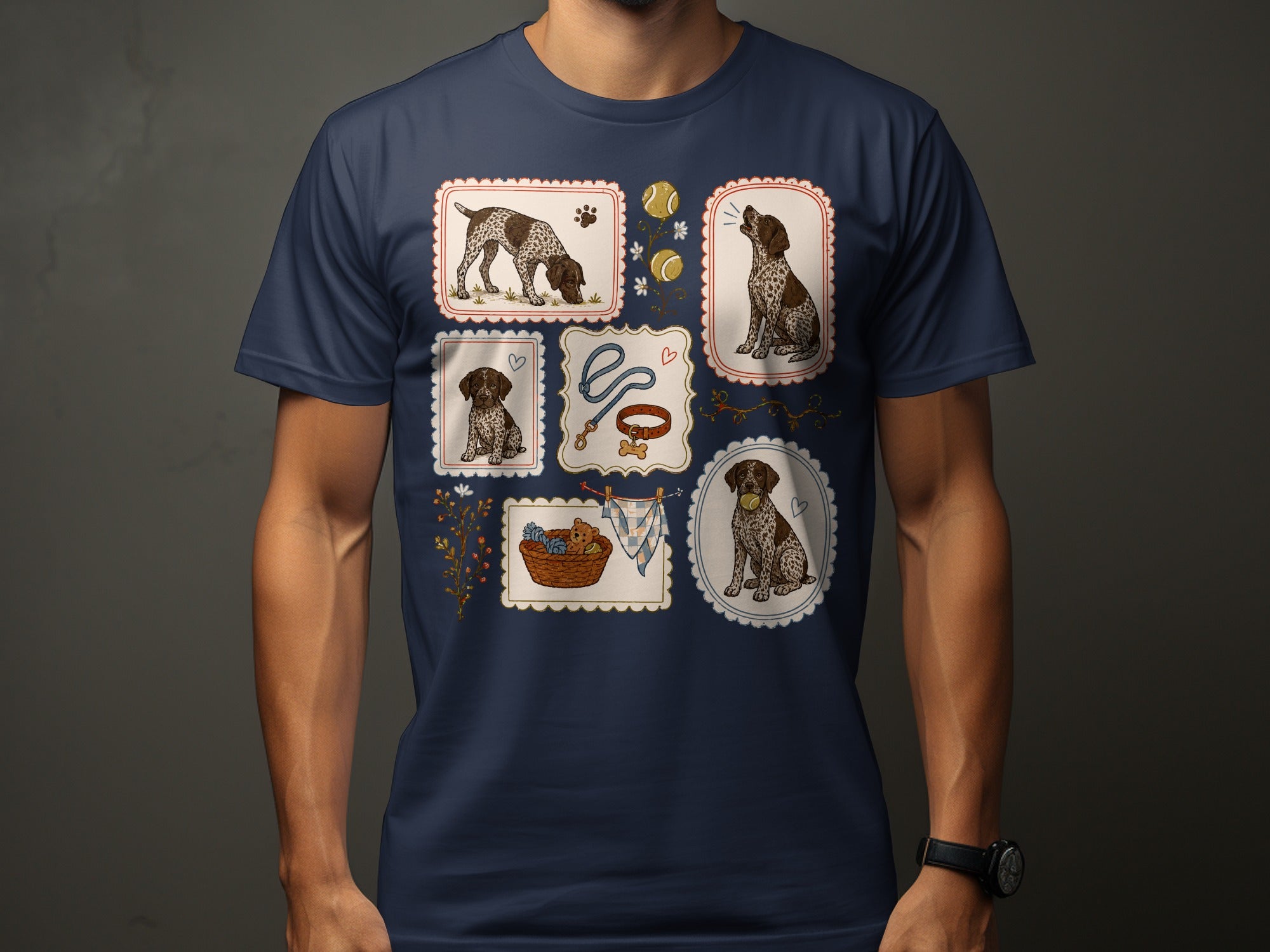 Framed illustrations of a dog and dog accessories on a navy t-shirt.