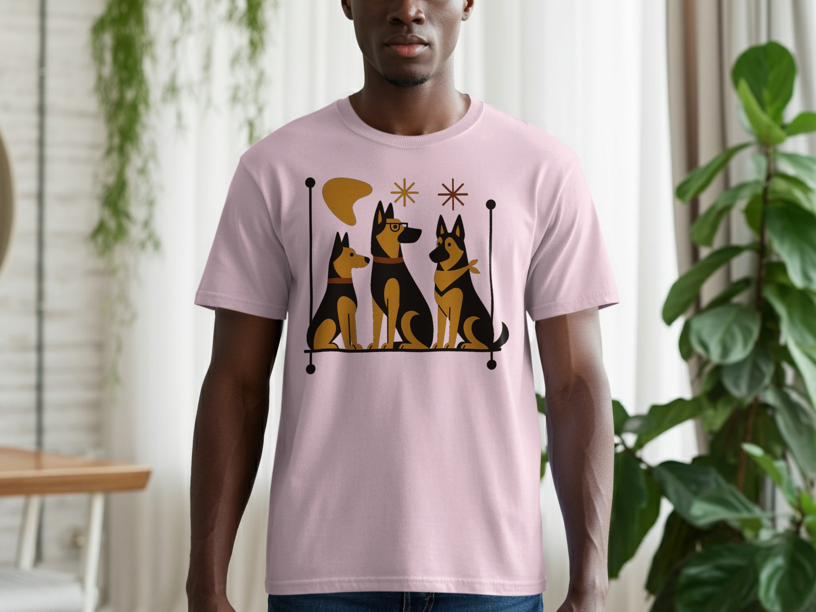 Pink t-shirt with a graphic of three German Shepherds in a mid-century modern style.