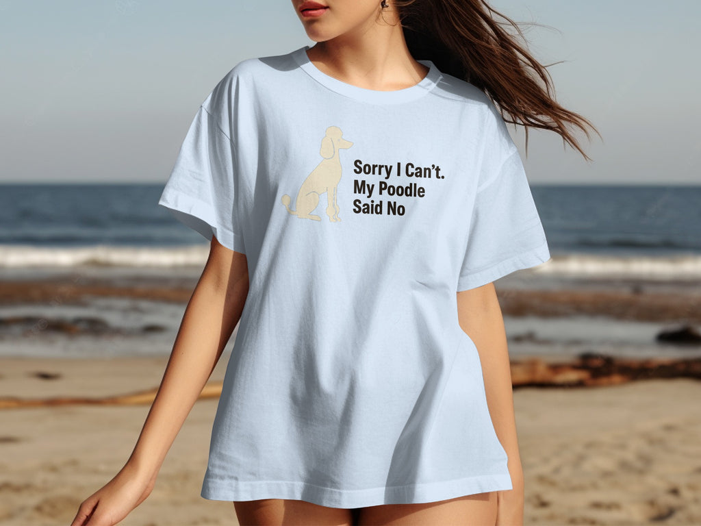 Light blue t-shirt with a cartoon poodle and "Sorry I Can't. My Poodle Said No" text.