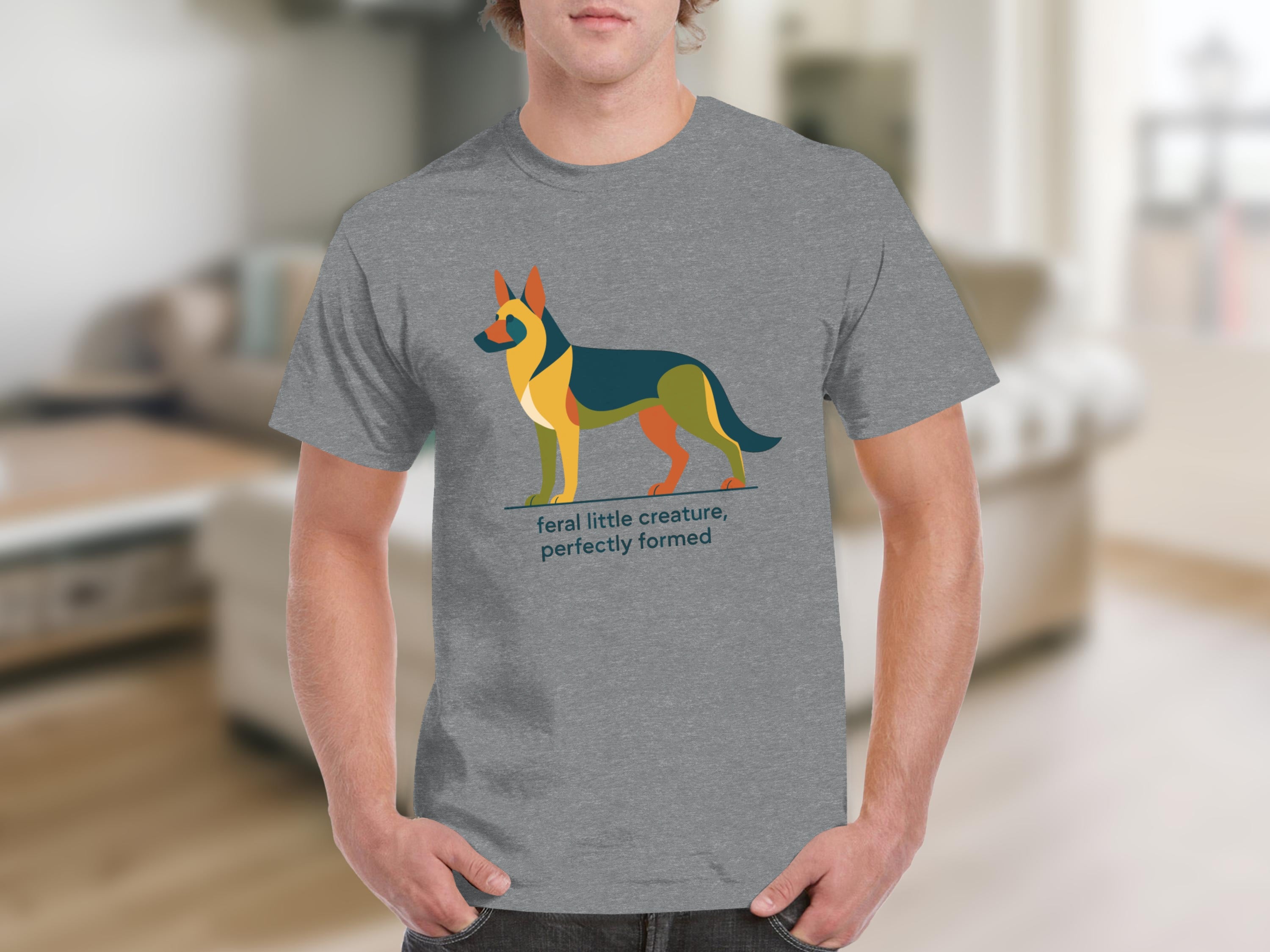 German Shepherd graphic with text "feral little creature, perfectly formed" on grey t-shirt.