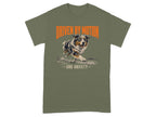 Dog running with "Driven by Motion and Anxiety" text on olive green t-shirt.