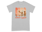 T-shirt with four vertical panels of golden retrievers playing fetch by the water with text "THROW IT AGAIN!".