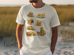 White t-shirt with a collage of cartoon golden retrievers in various outdoor activities.
