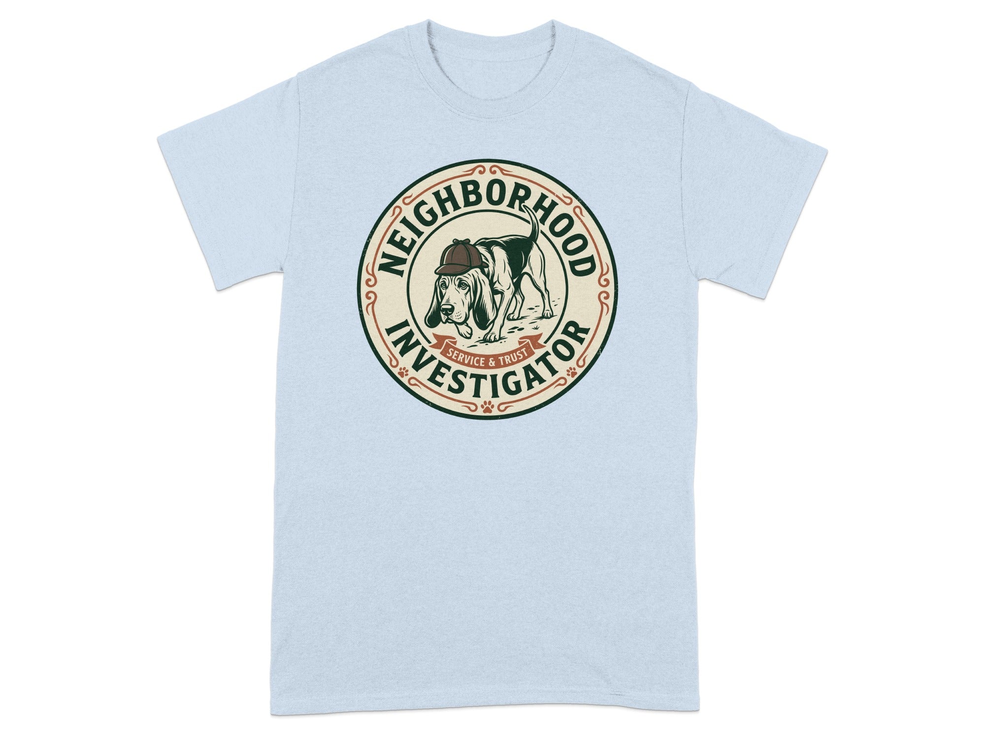 Light blue t-shirt with a circular graphic of a dog wearing a hat, labeled "Neighborhood Investigator."