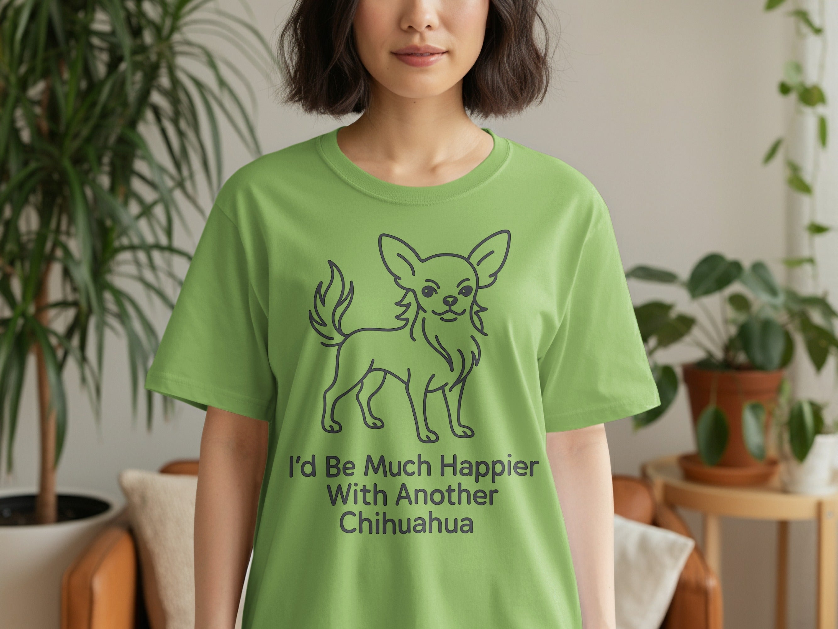 Green t-shirt with a minimalist chihuahua graphic and the text "I'd Be Much Happier With Another Chihuahua."