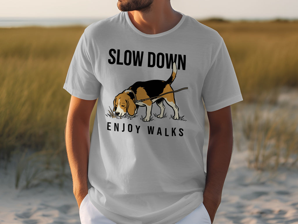 White t-shirt with "SLOW DOWN ENJOY WALKS" text and a beagle dog illustration.