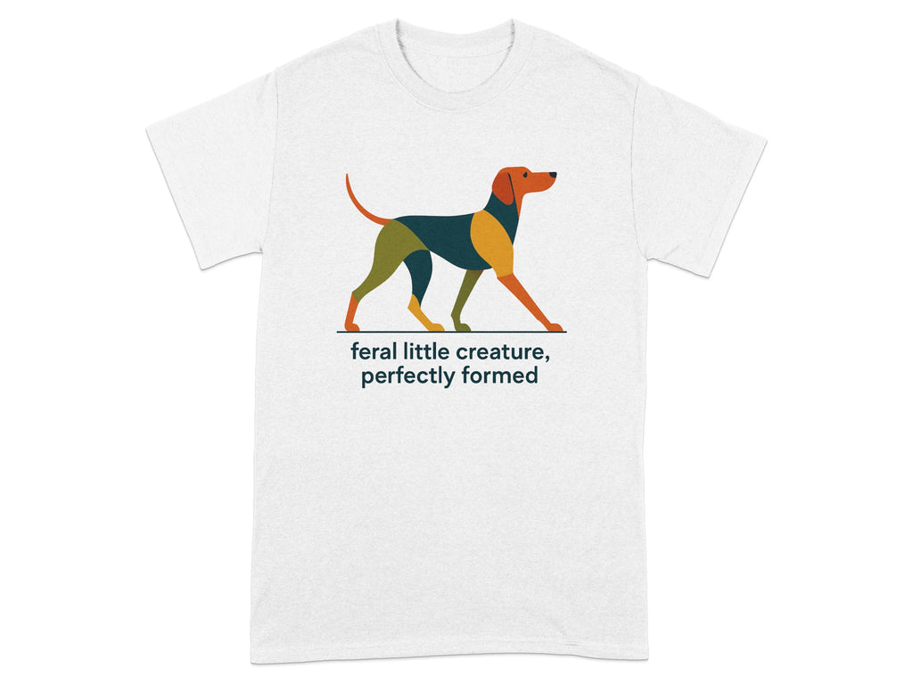 White t-shirt with a geometric dog design and text "feral little creature, perfectly formed."