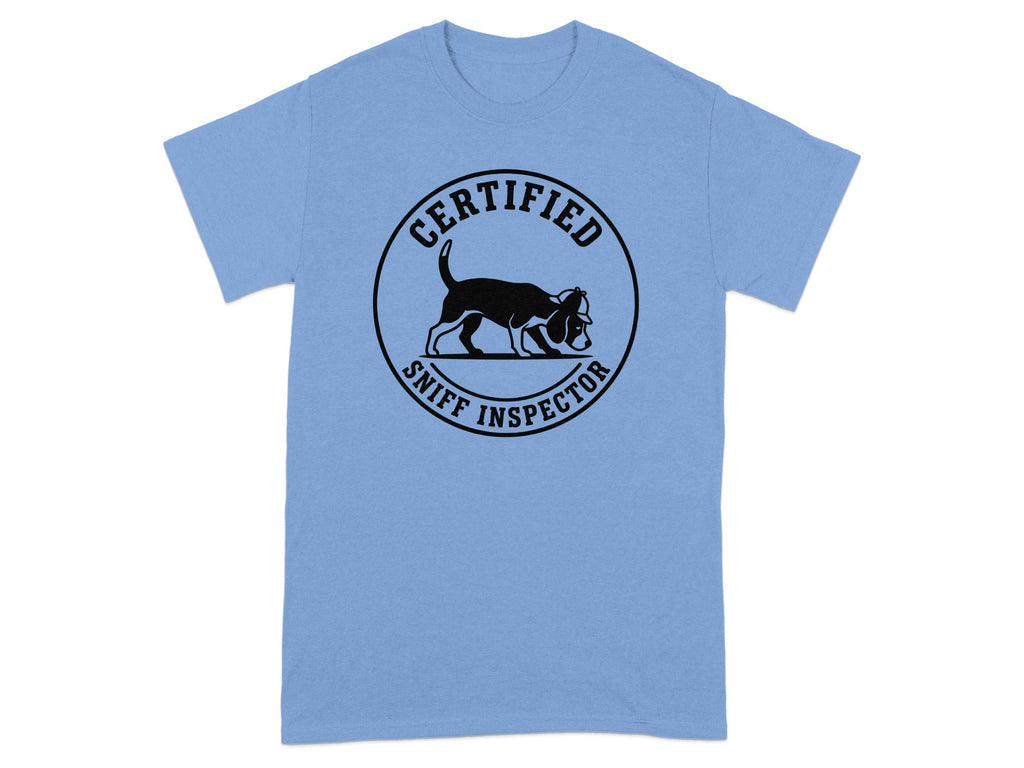 Light blue t-shirt with circular "Certified Sniff Inspector" logo featuring a dog.