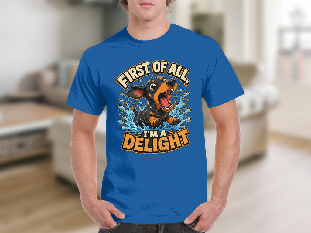 Blue t-shirt with cartoon dachshund splashing in water, text "First of all, I'm a delight."