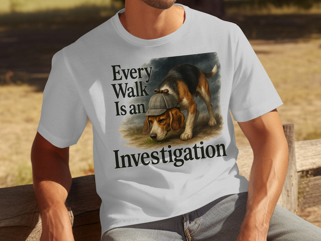 White t-shirt with beagle wearing hat and text "Every Walk Is an Investigation".