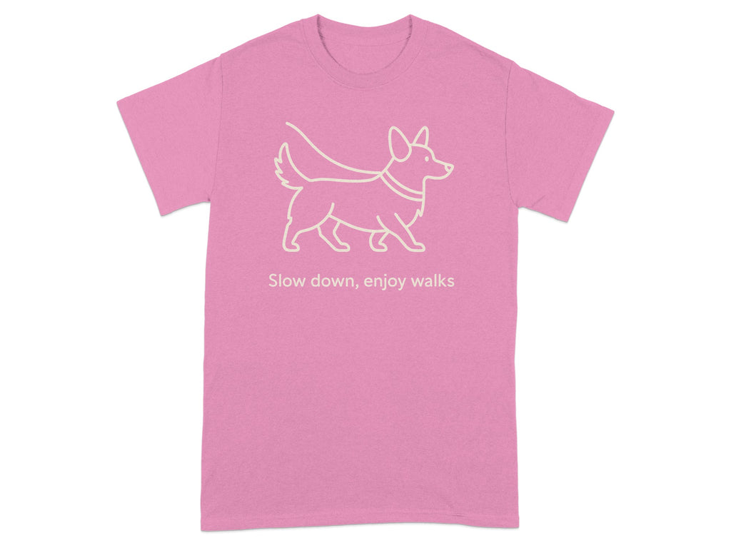 Pink t-shirt with white outline of a corgi and text "Slow down, enjoy walks".