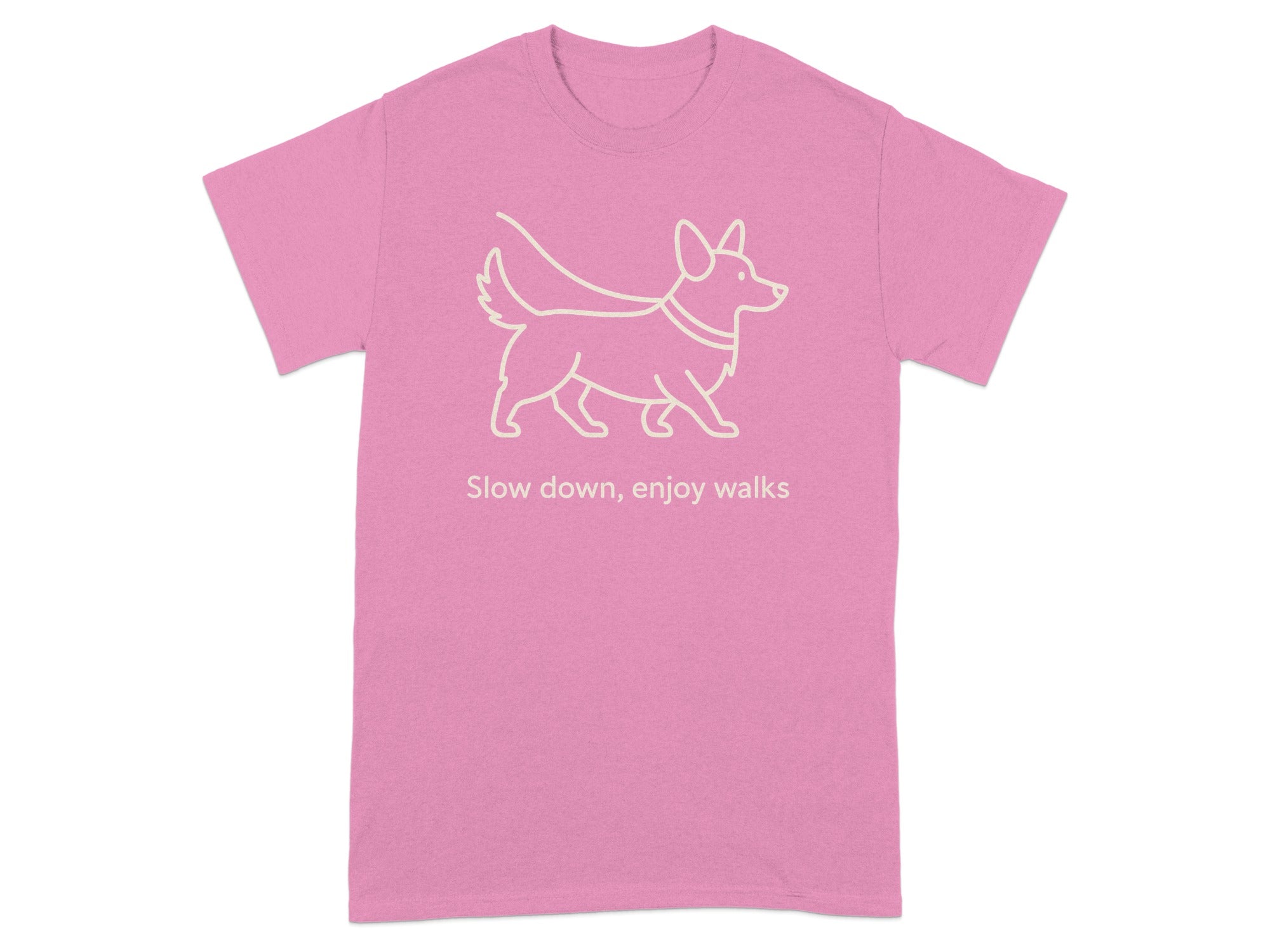 Pink t-shirt with white outline of a corgi and text "Slow down, enjoy walks".