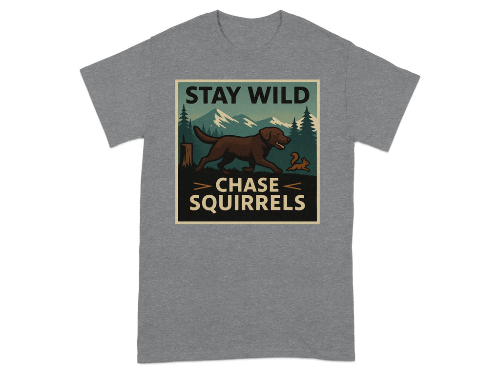 T-shirt with brown dog chasing a squirrel in a wilderness scene with text.
