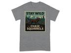 T-shirt with brown dog chasing a squirrel in a wilderness scene with text.