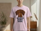 Pink t-shirt with a brown dachshund and the text "DEVOTED. DORXY. DOXIE."